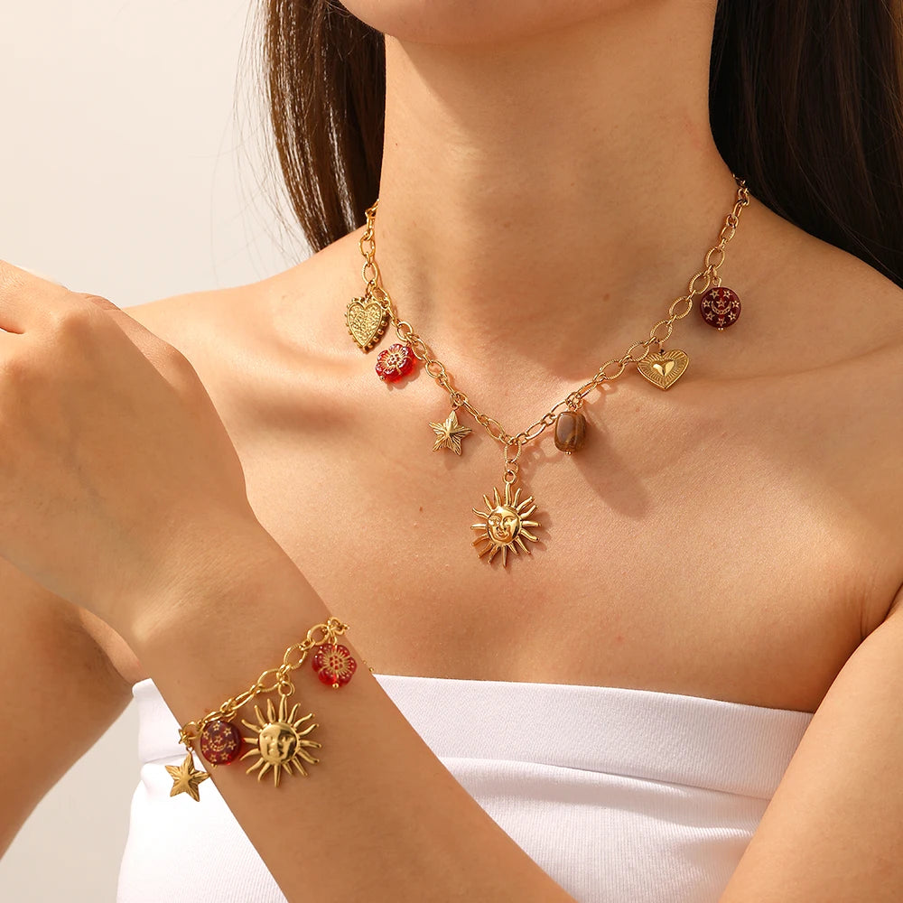 DIEYURO 316L Stainless Steel Golden Personality Sun Star Heart Red Crystal Flower Pendant Necklace Lady Trend Neck Chain Jewelry